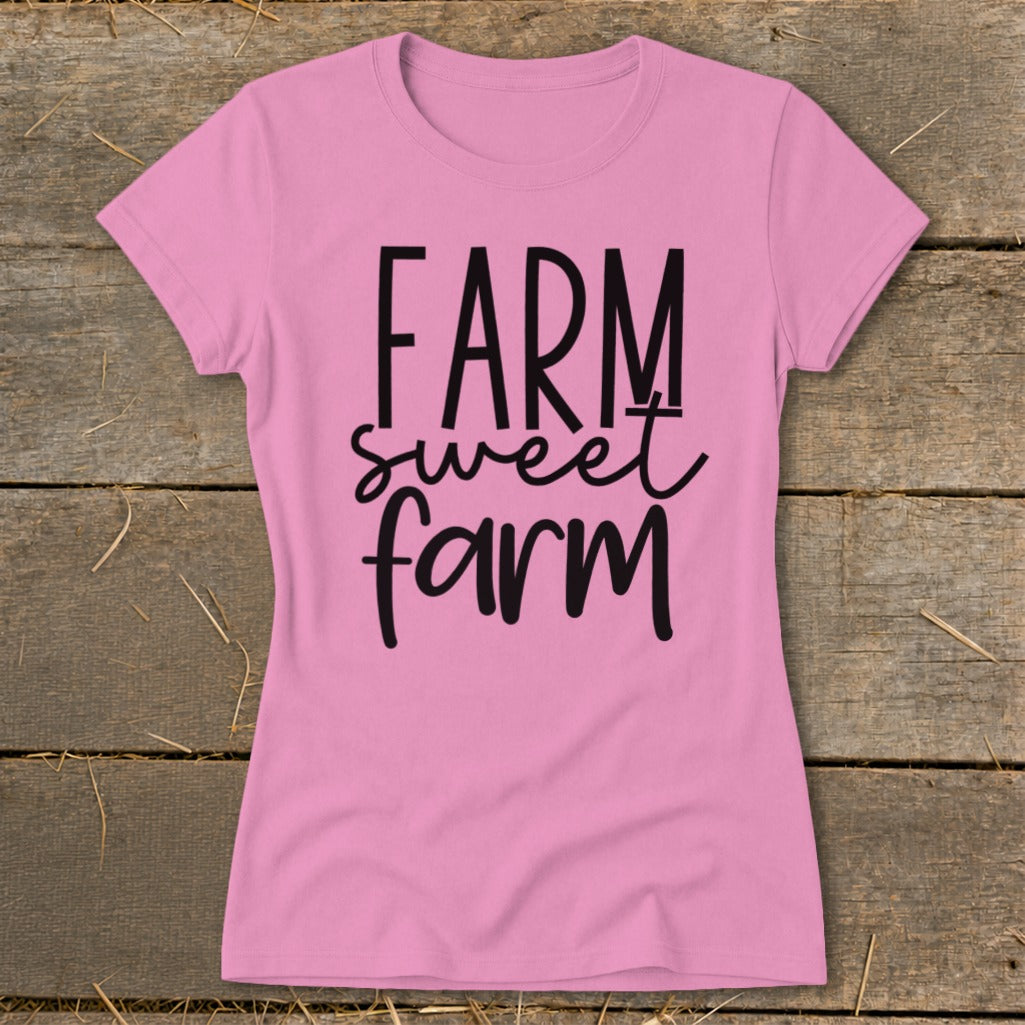 Pink t-shirt with black text reading "FARM sweet farm".