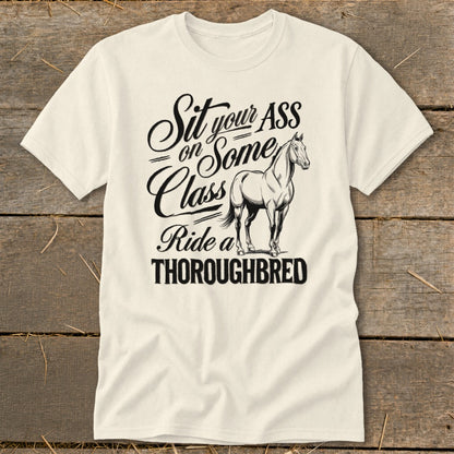 T-shirt with "Sit your ASS on Some Class Ride a THOROUGHBRED" and a horse.