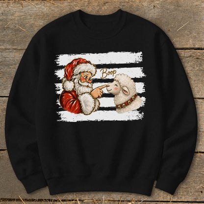 Santa booping a sheep with "Boop" text on a black sweatshirt.
