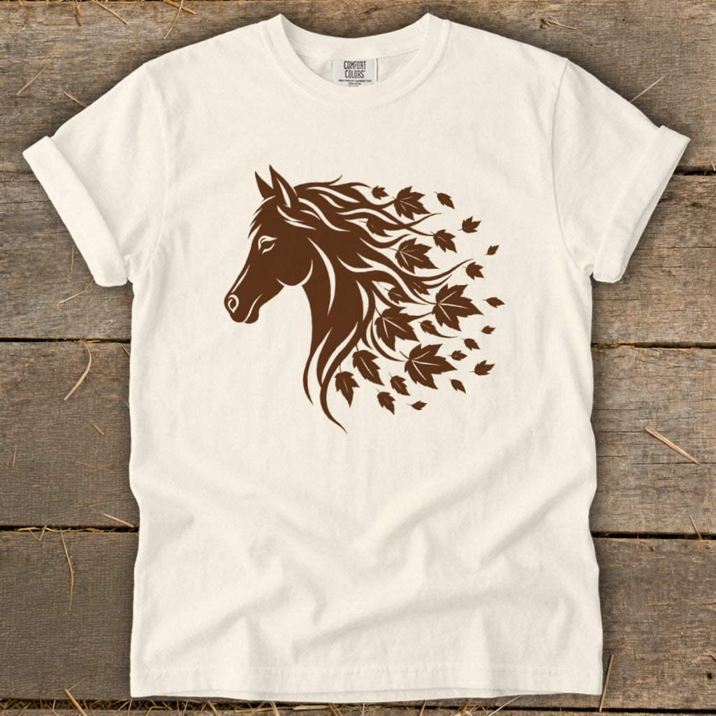 Cream t-shirt with brown horse head and flowing mane of leaves.