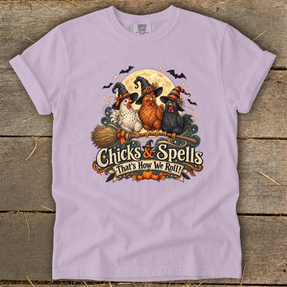 Three witch chickens on a broomstick with "Chicks & Spells That's How We Roll!" text.