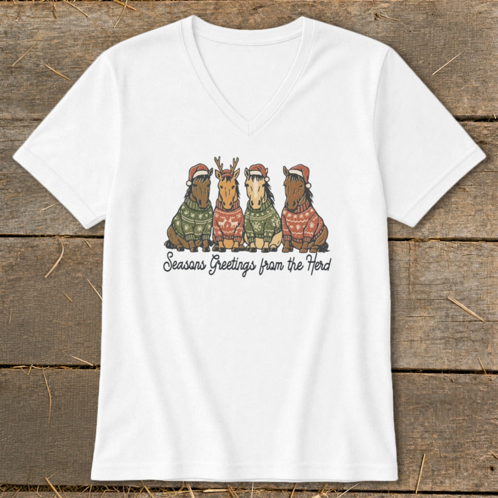 Four horses in Christmas sweaters and Santa hats with "Seasons Greetings from the Herd" text.