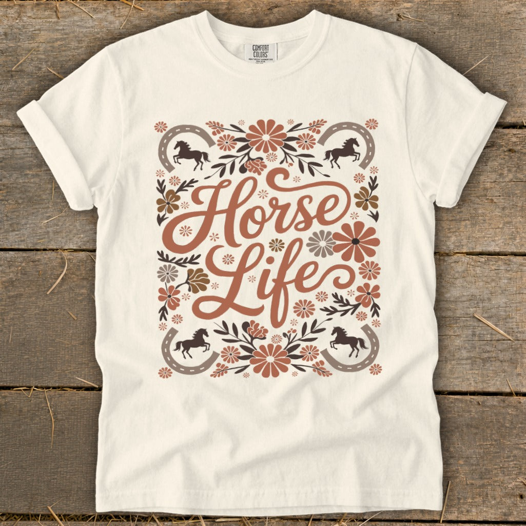 Cream t-shirt with floral and horse motif and "Horse Life" text.
