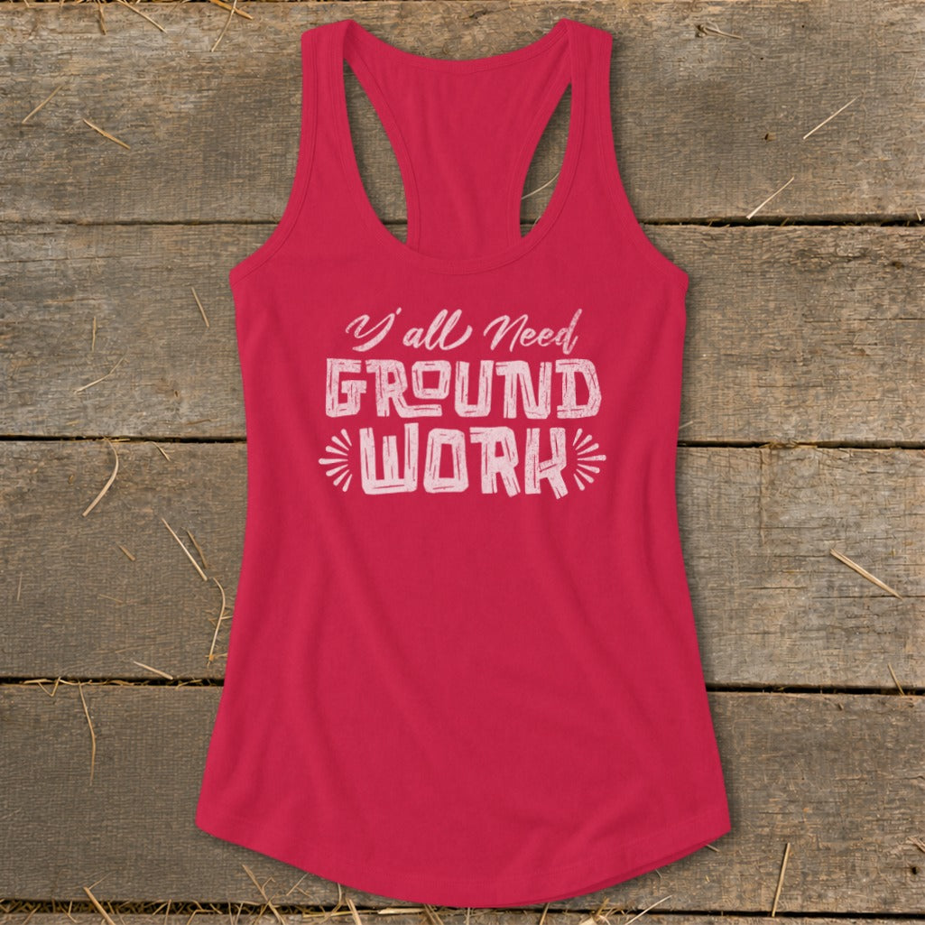 Fuchsia racerback tank top with "Y'all Need GROUND WORK" text.