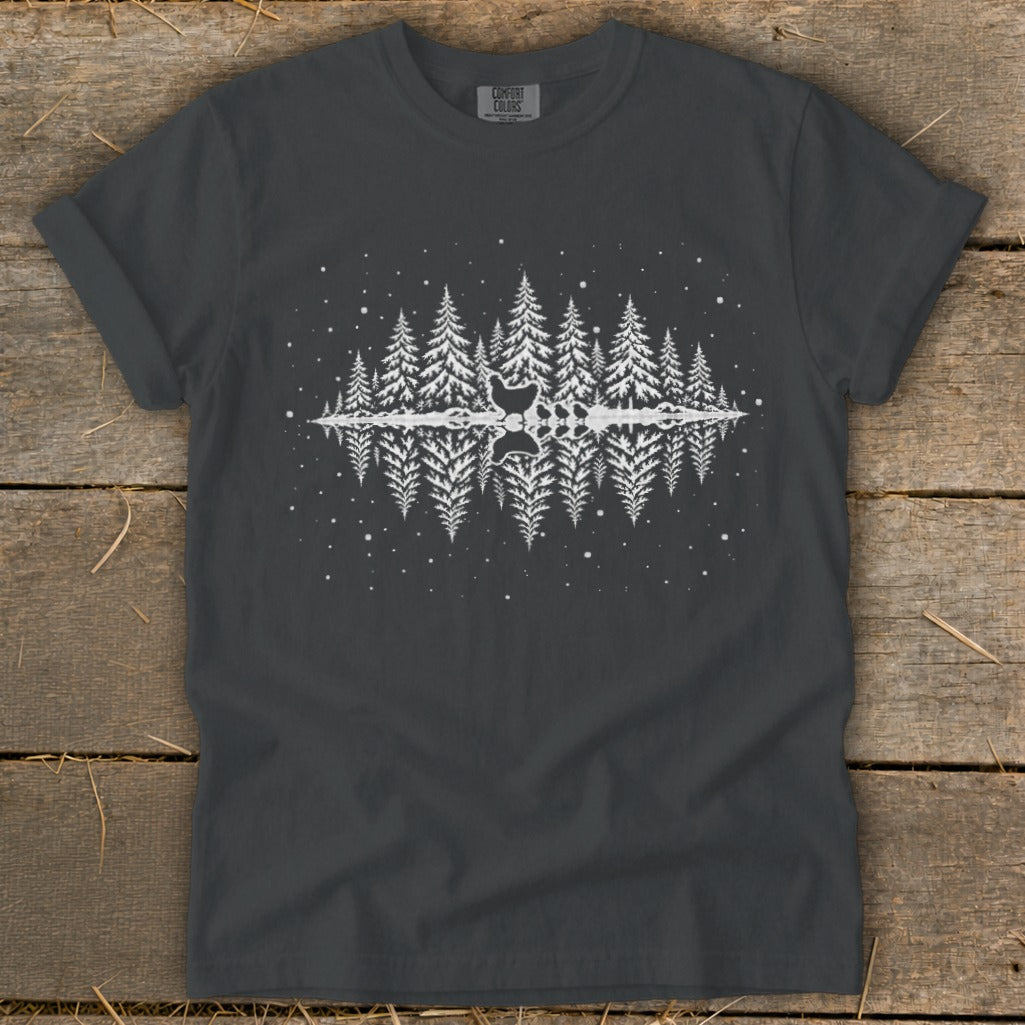 Dark grey t-shirt with a white graphic of a forest reflected in water with chickens.