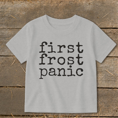 Light grey t-shirt with black text "first frost panic" in typewriter font.