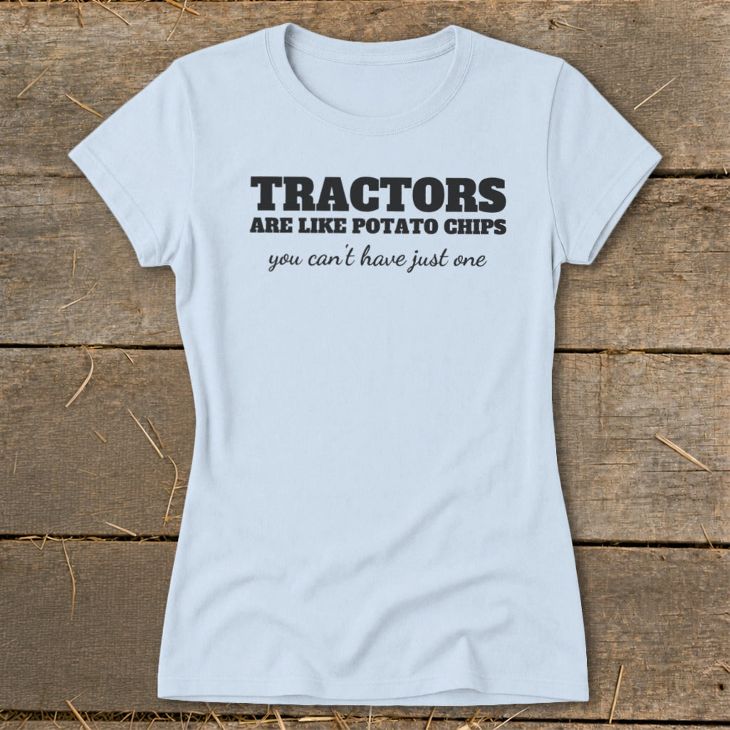 Light blue t-shirt with black text: "TRACTORS ARE LIKE POTATO CHIPS you can't have just one".