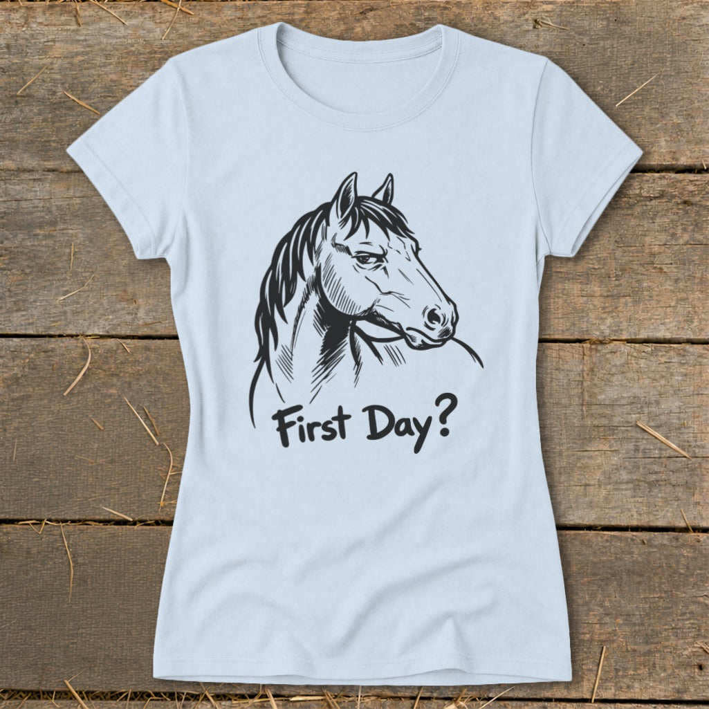 Light blue t-shirt with black sketch of a horse's head and "First Day?" text.