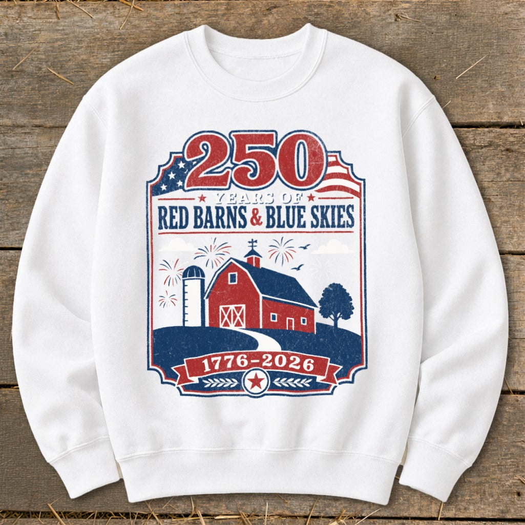 White sweatshirt with "250 Years of Red Barns & Blue Skies 1776-2026" graphic.