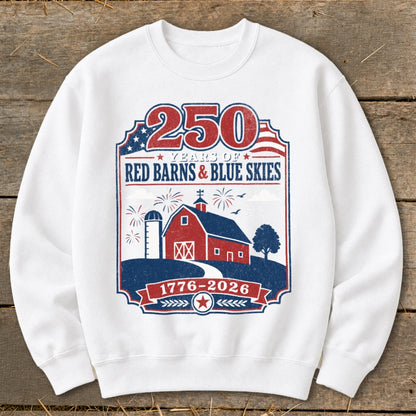 White sweatshirt with "250 Years of Red Barns & Blue Skies 1776-2026" graphic.