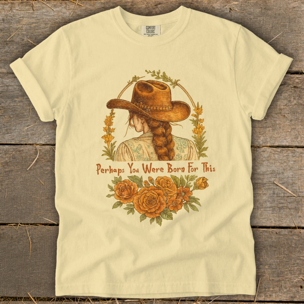 Woman with cowboy hat and braid, floral wreath, and text "Perhaps You Were Born For This".