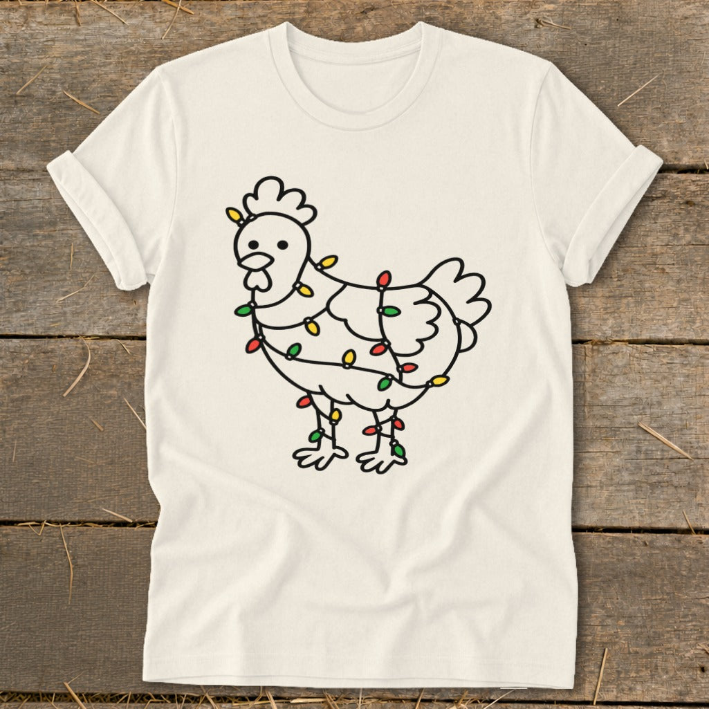Cream t-shirt with a black outline drawing of a chicken wrapped in colorful Christmas lights.