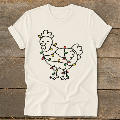 Cream t-shirt with a black outline drawing of a chicken wrapped in colorful Christmas lights.