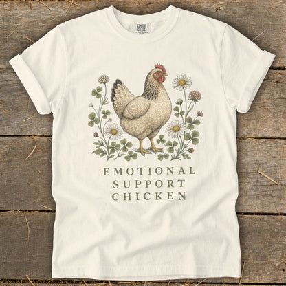 White t-shirt with chicken and flowers graphic and "Emotional Support Chicken" text.