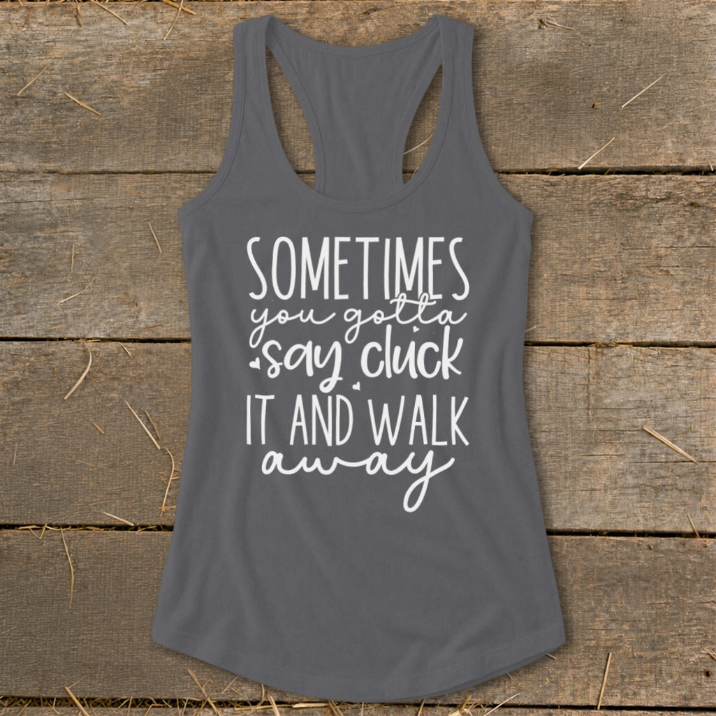 Gray tank top with white text reading "Sometimes you gotta say cluck it and walk away".