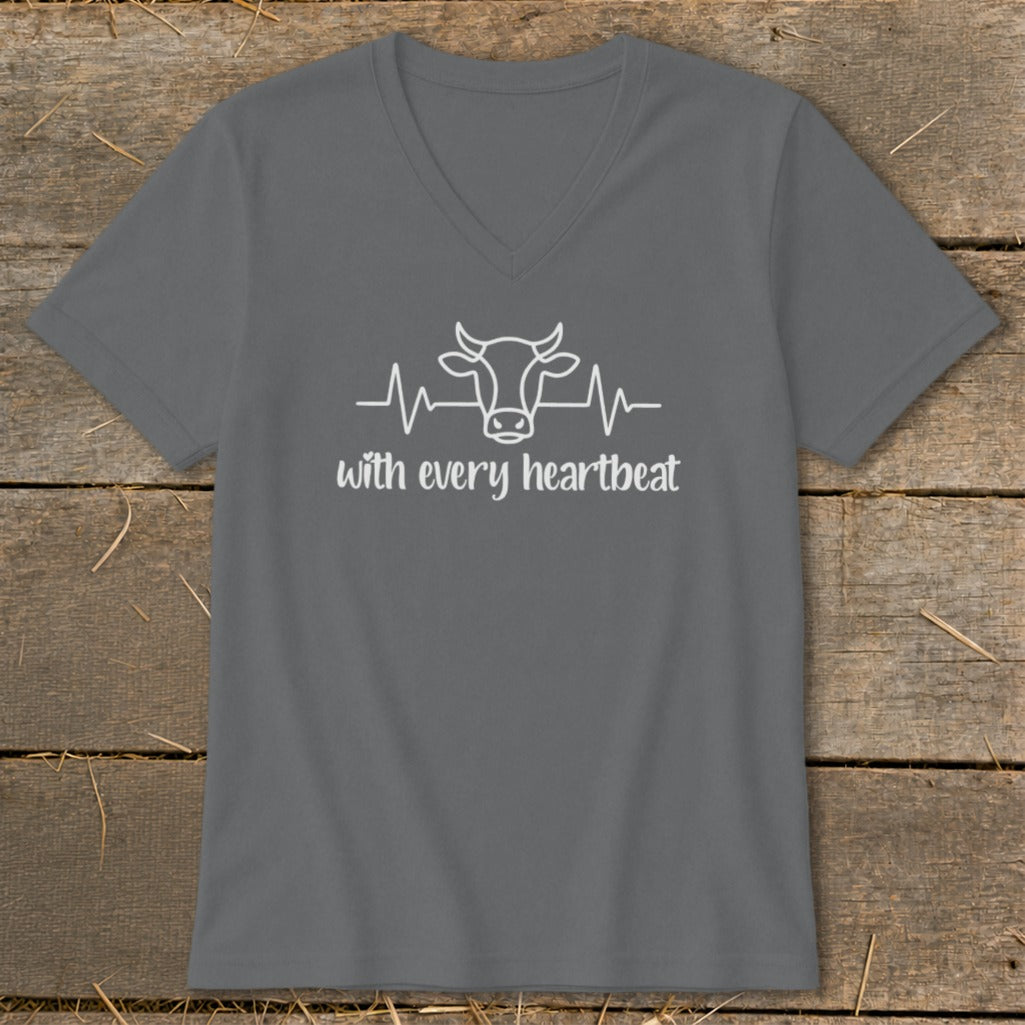 Gray v-neck t-shirt with a white outline of a cow's head on a heartbeat line and the text "with every heartbeat".