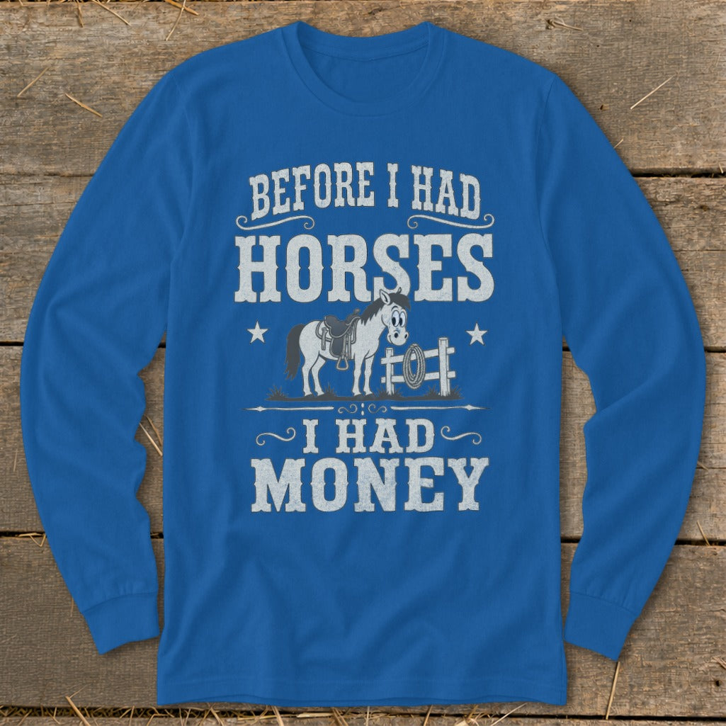Blue long sleeve shirt with text "BEFORE I HAD HORSES I HAD MONEY" and a cartoon horse.