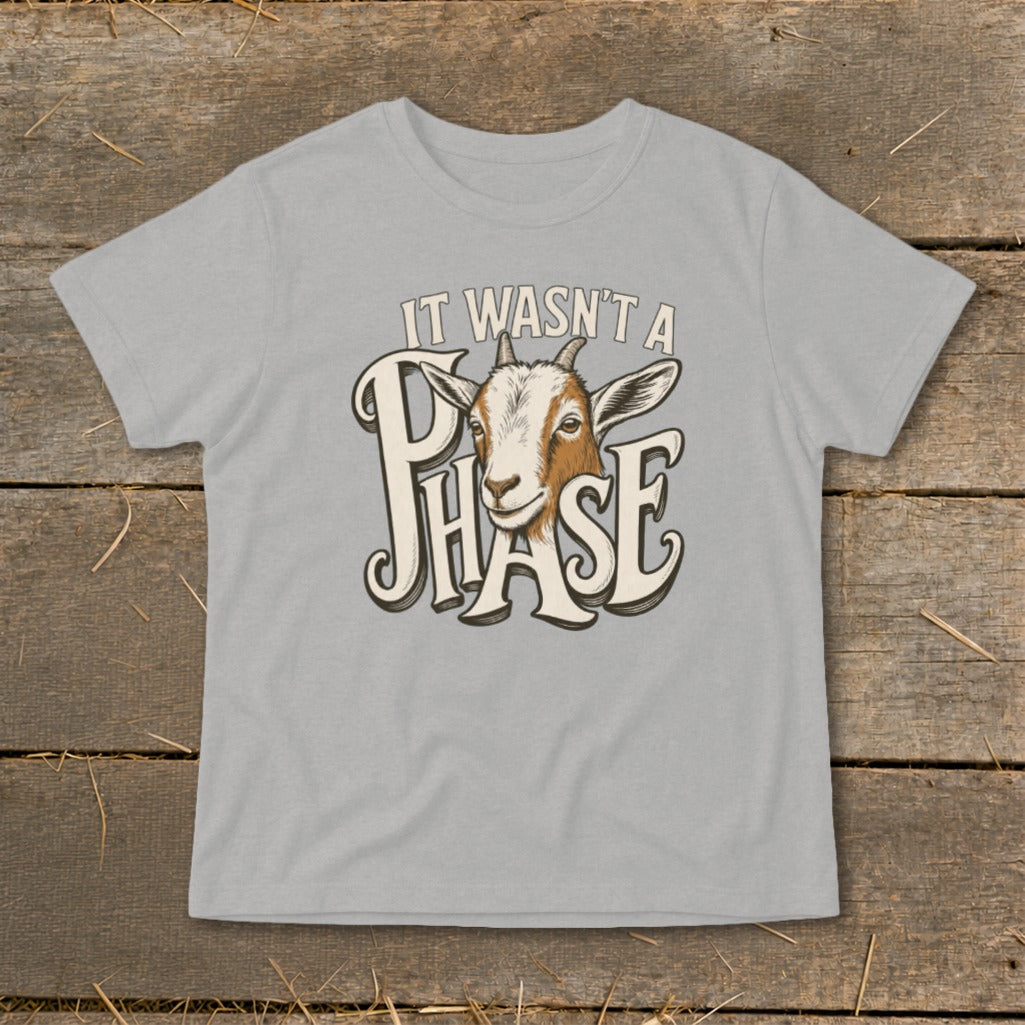 Light grey t-shirt with goat graphic and text "It wasn't a phase".