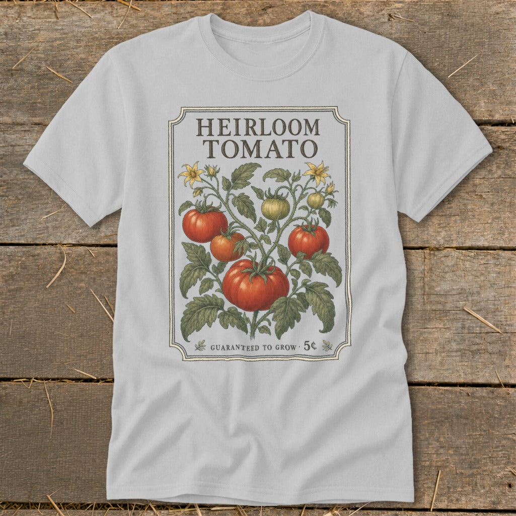 Light gray t-shirt with "Heirloom Tomato" seed packet design and vine graphic.