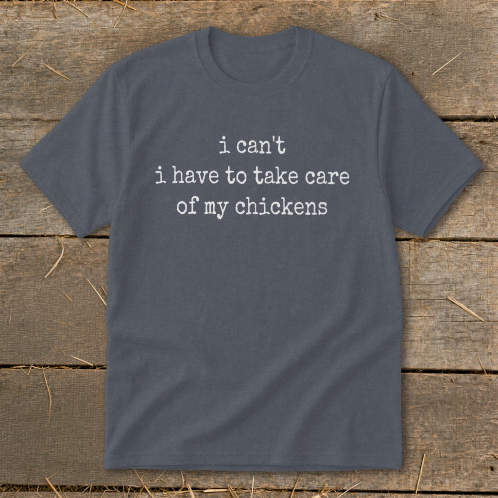 Grey t-shirt with white text "i can't i have to take care of my chickens".