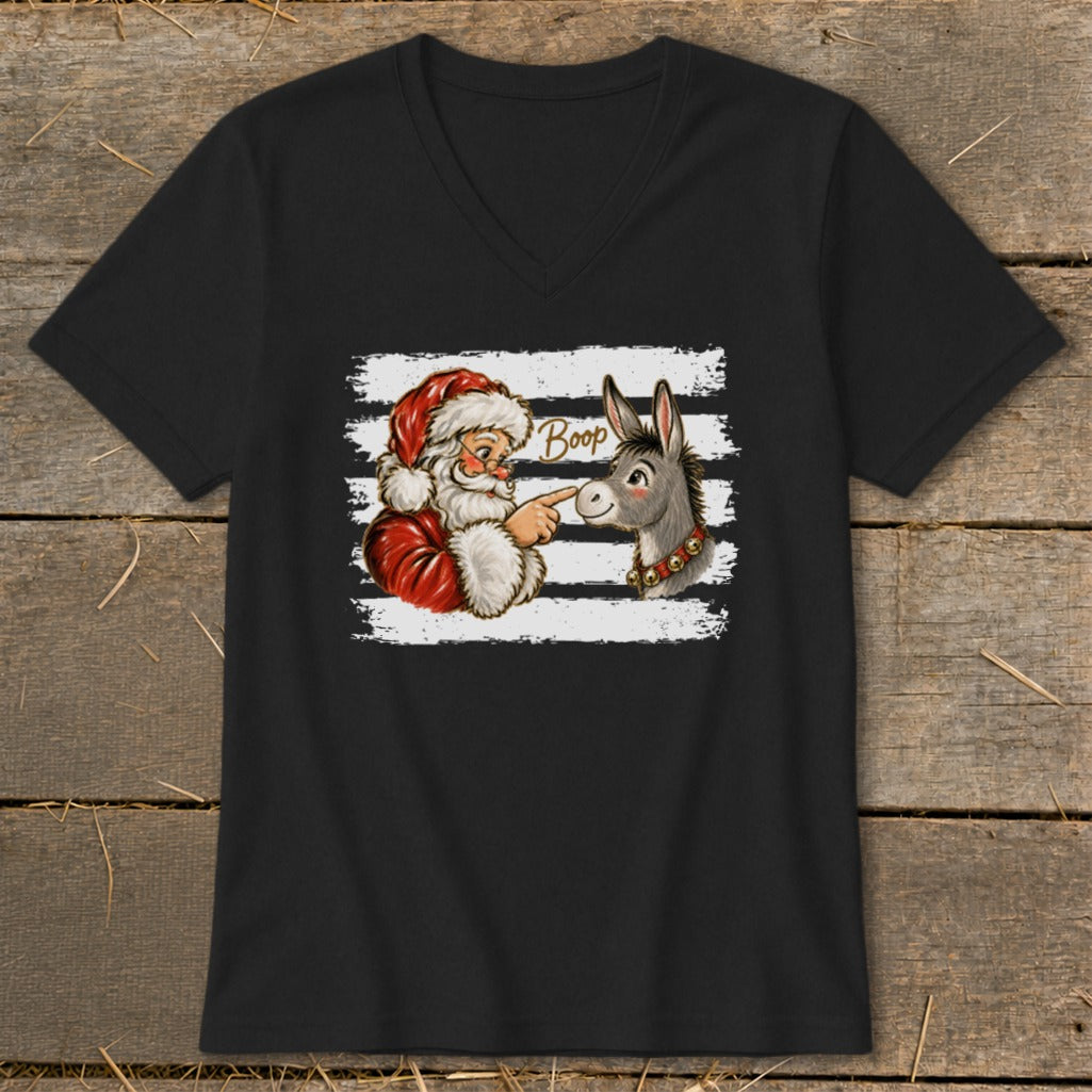Santa booping a donkey's nose, with the word "Boop" above.
