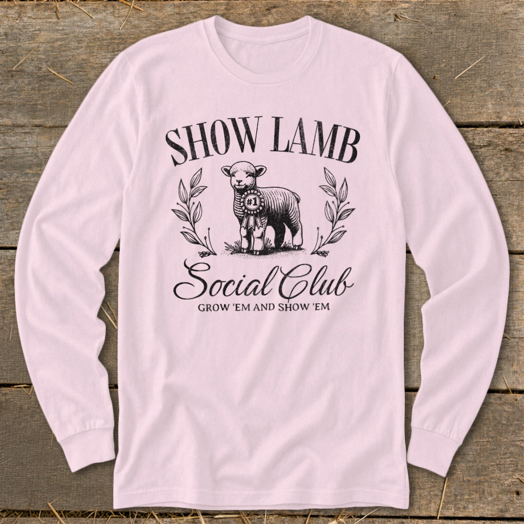 Light pink long-sleeve shirt with "SHOW LAMB Social Club" and a lamb graphic.
