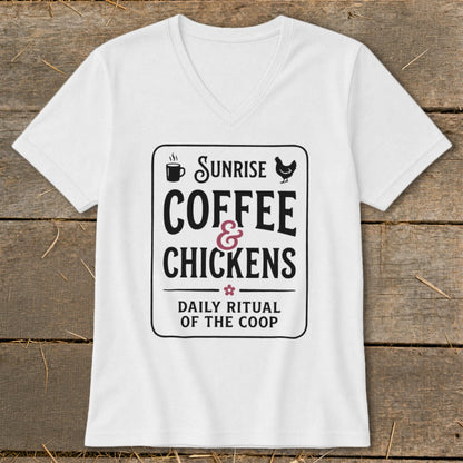 White v-neck t-shirt with "Sunrise Coffee & Chickens Daily Ritual of the Coop" graphic.