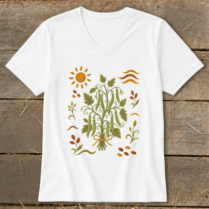 White t-shirt with a V-neck featuring a botanical illustration of pea pods and sun.