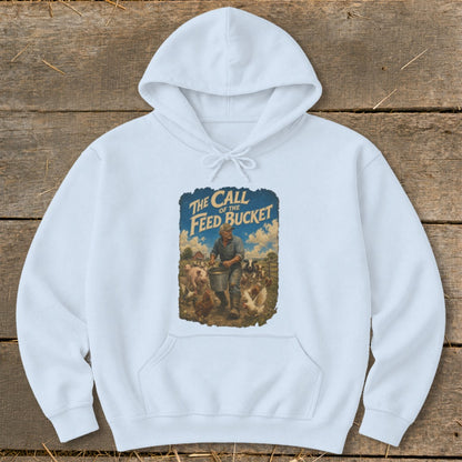 Light blue hoodie with "The Call of the Feed Bucket" graphic of a farmer feeding livestock.