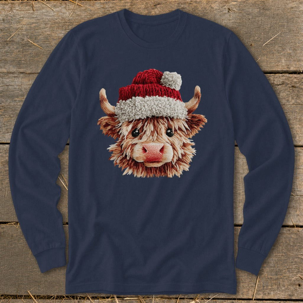 Navy long-sleeve shirt featuring a Highland cow wearing a Santa hat.