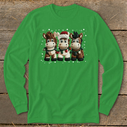 Three cartoon horses wearing Christmas scarves and one with a Santa hat, surrounded by snowflakes.