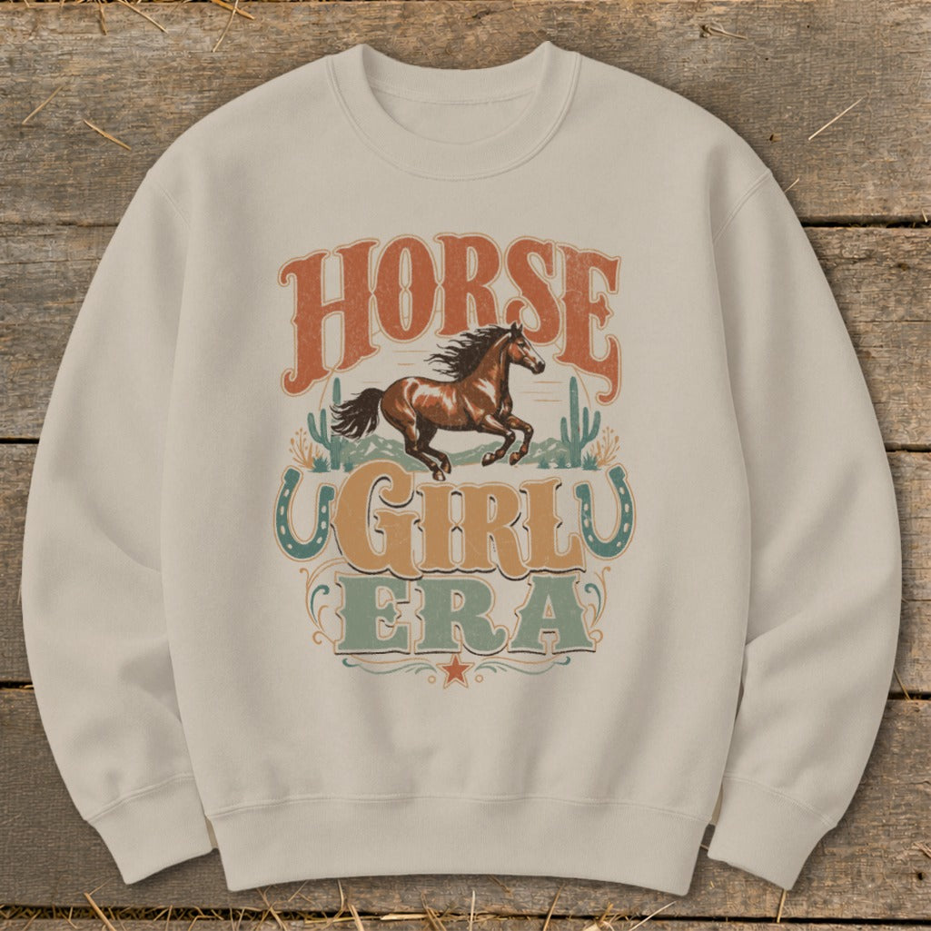 Cream sweatshirt with "Horse Girly Era" text and a horse graphic.