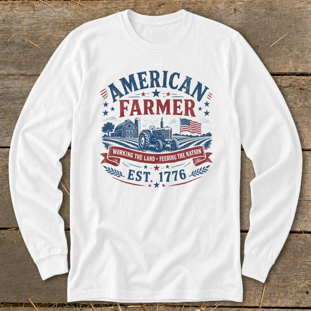 White long sleeve shirt with "American Farmer" graphic, tractor, barn, and flag.