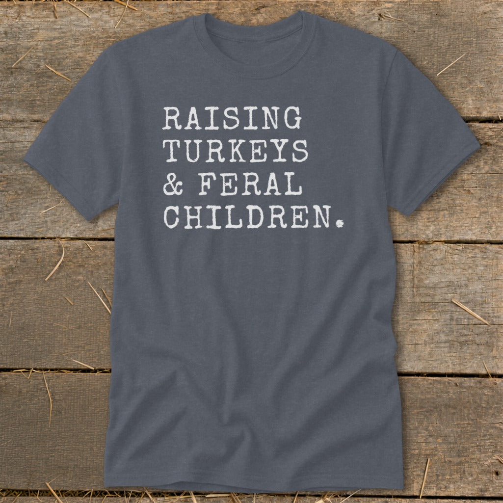 Gray t-shirt with white text "RAISING TURKEYS & FERAL CHILDREN."