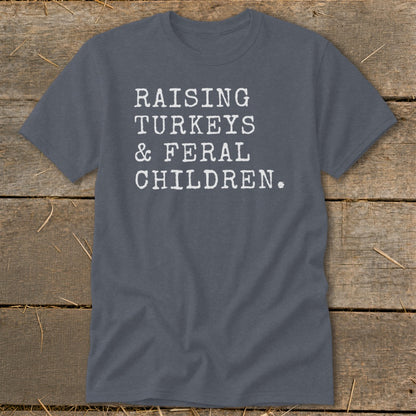 Gray t-shirt with white text "RAISING TURKEYS & FERAL CHILDREN."