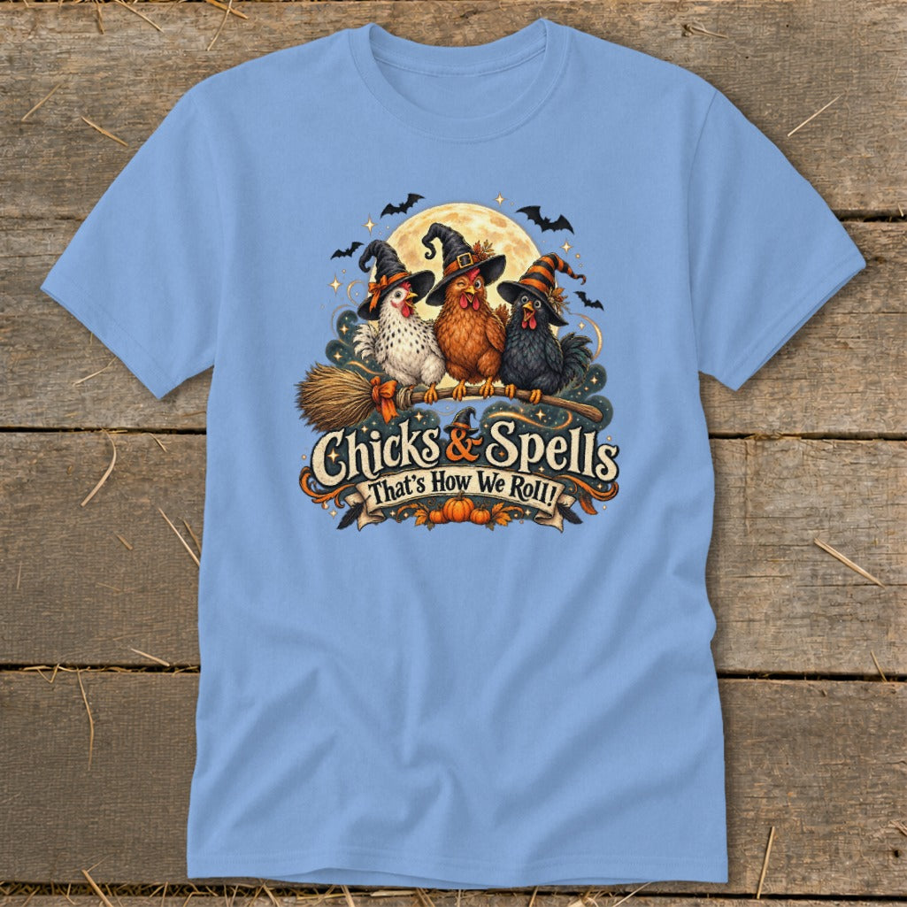 Three chickens in witch hats on a broomstick with "Chicks & Spells" text.