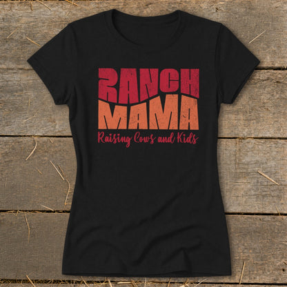 Black t-shirt with "RANCH MAMA Raising Cows and Kids" text.