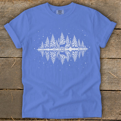 Blue t-shirt with white graphic of deer, trees, and reflection.