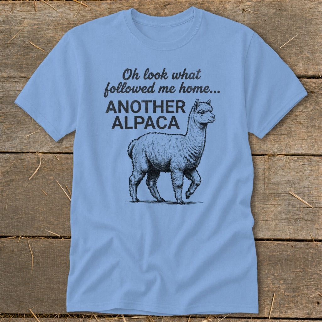 Light blue t-shirt with black text and sketch of an alpaca.