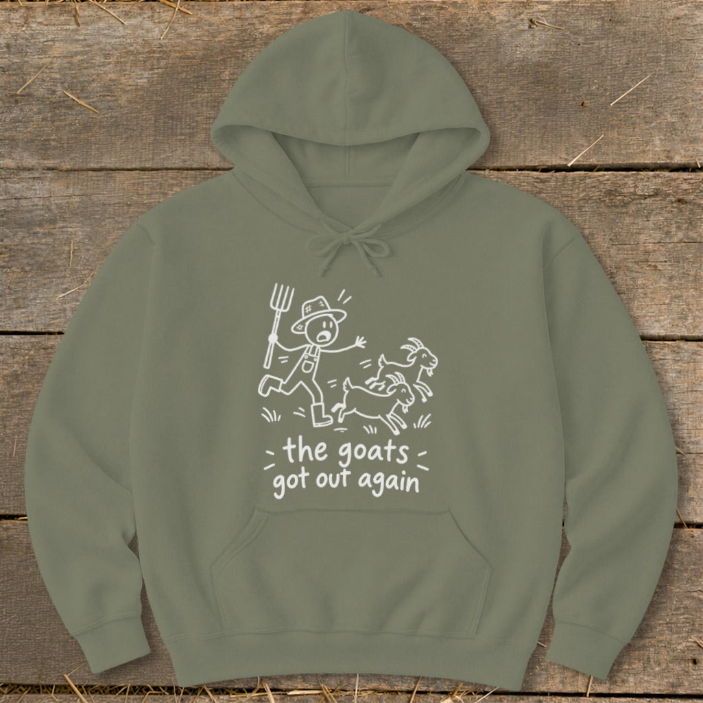 Olive green hoodie with white graphic of a farmer chasing two goats, text reads "the goats got out again".