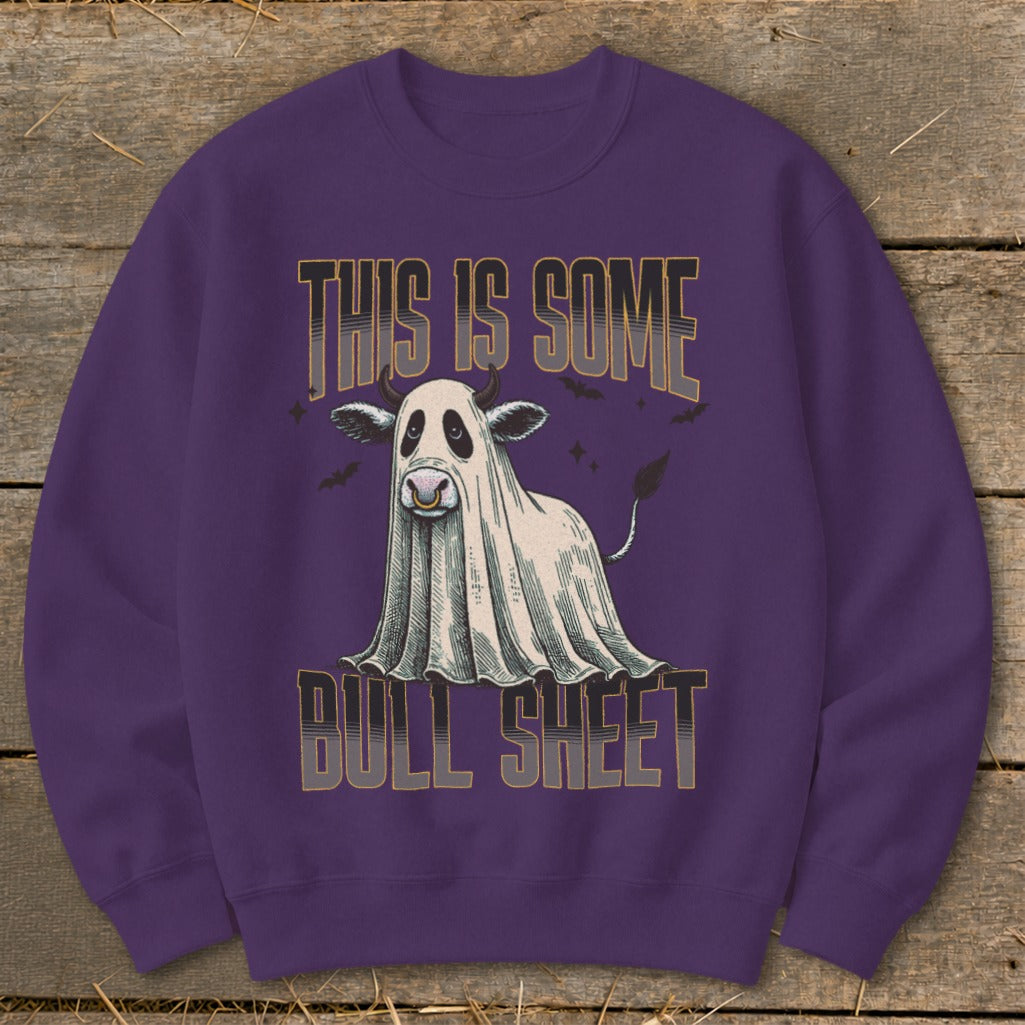 Cow ghost graphic with text "THIS IS SOME BULL SHEET" on purple sweatshirt.