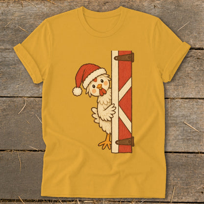 Chicken wearing Santa hat peeking from behind a red barn door.