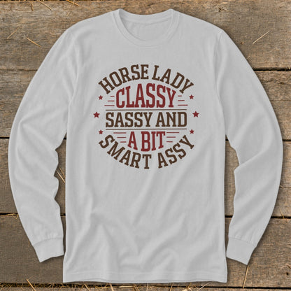 White long-sleeve shirt with "Horse Lady Classy Sassy and a Bit Smart Assy" text.