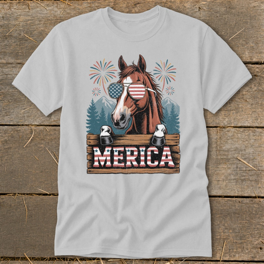 Horse wearing American flag sunglasses, with "MERICA" text and fireworks.