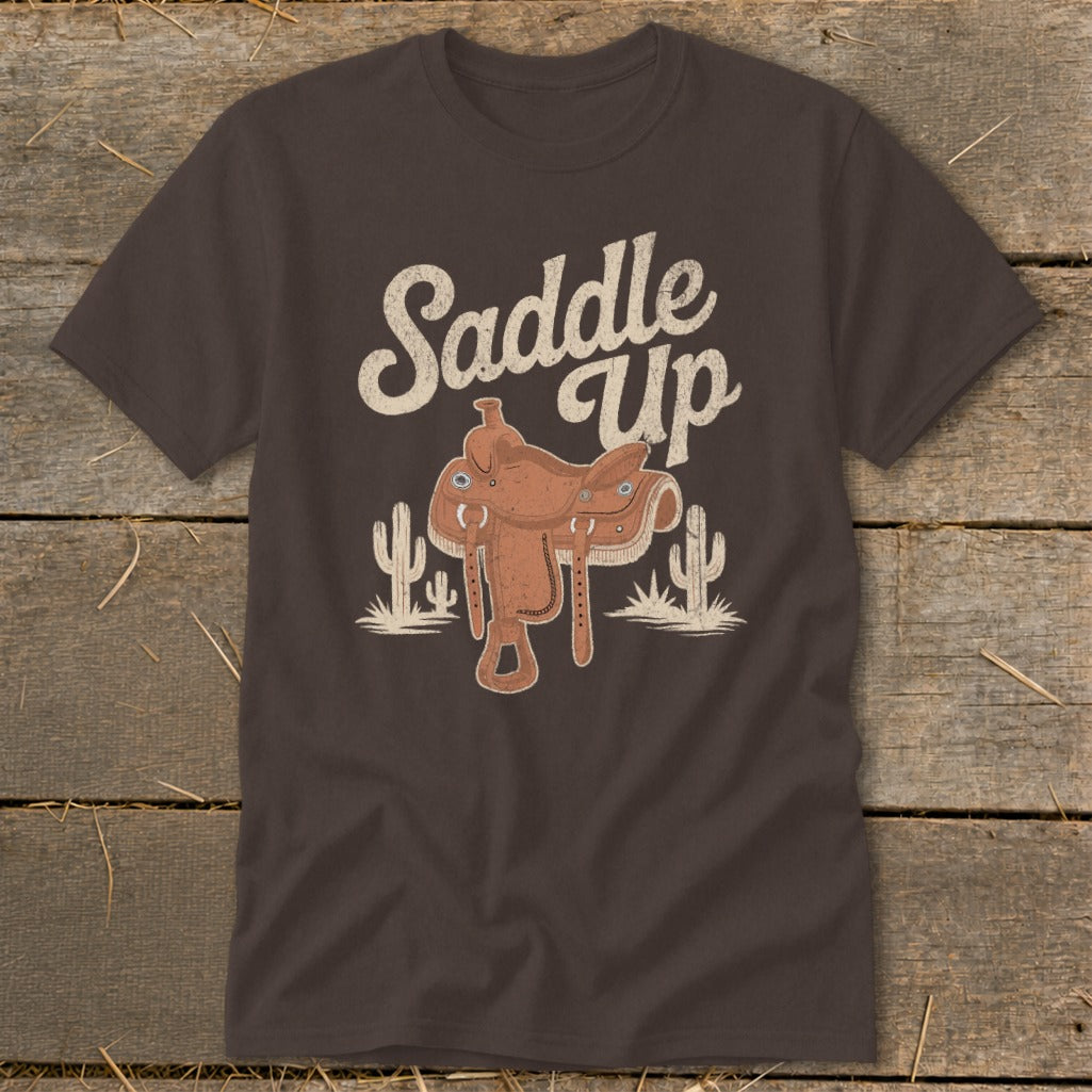 Brown t-shirt with "Saddle Up" text, saddle, and cacti graphic.