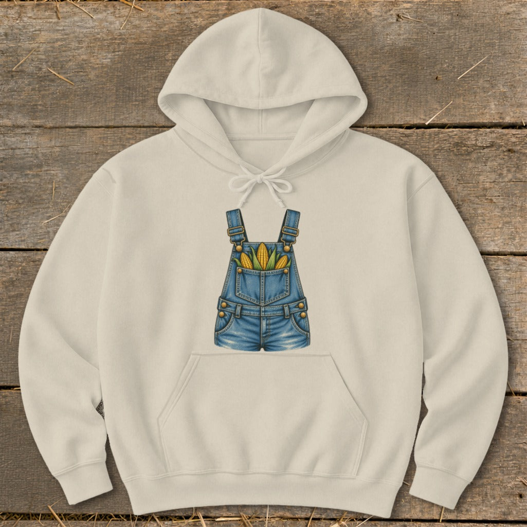 Cream hoodie with a denim overall design featuring corn in the pockets.