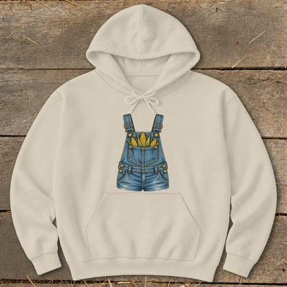 Cream hoodie with a denim overall design featuring corn in the pockets.
