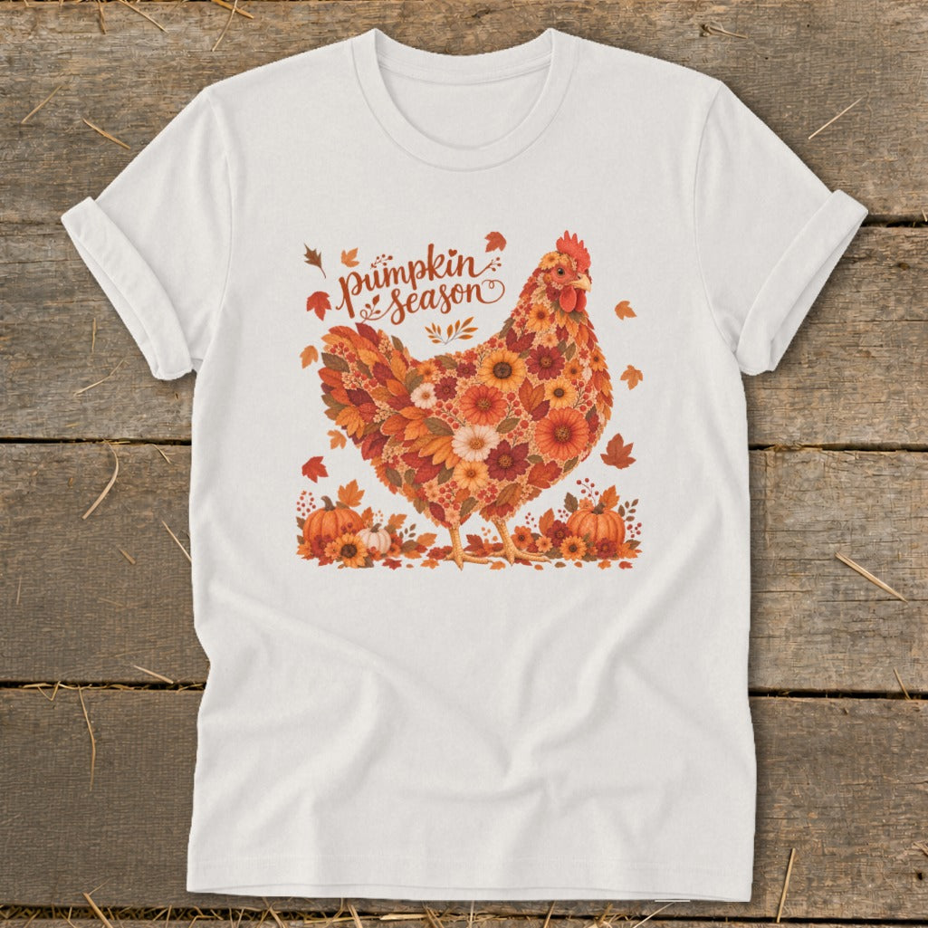 White t-shirt with a chicken graphic made of flowers and leaves, with text "pumpkin season".