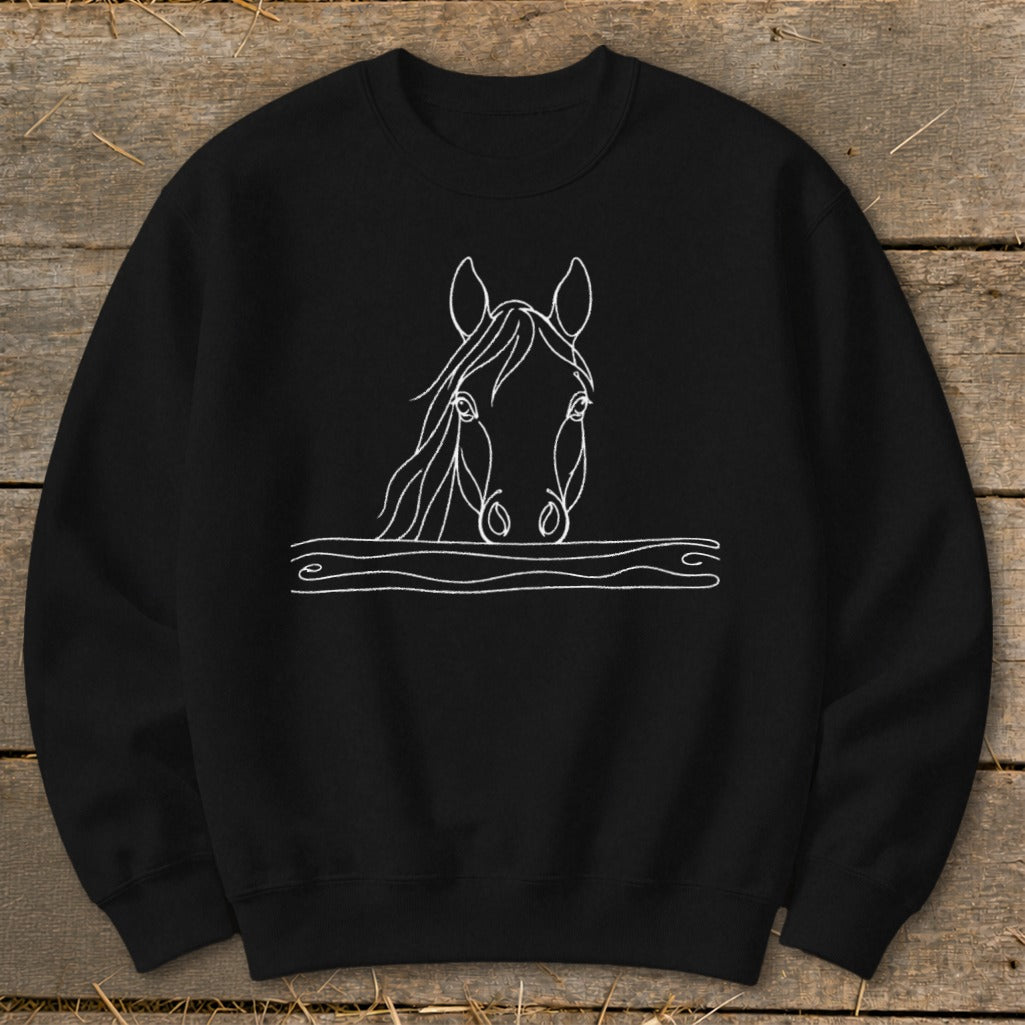 Black sweatshirt with a white line drawing of a horse's head peering over a line.