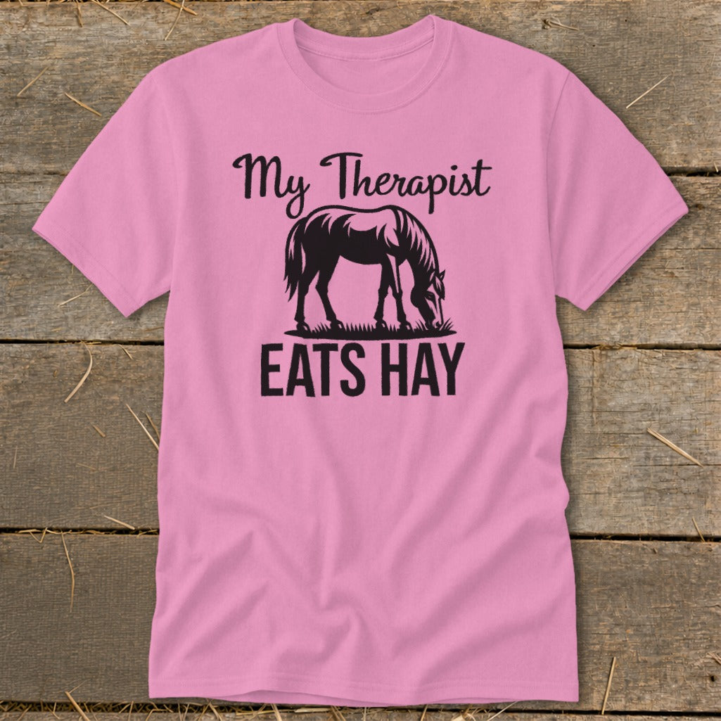 Pink t-shirt with "My Therapist EATS HAY" text and a horse graphic.